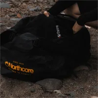 2026 Northcore Duffle Bag 85L NOCO123BB - Black / Orange